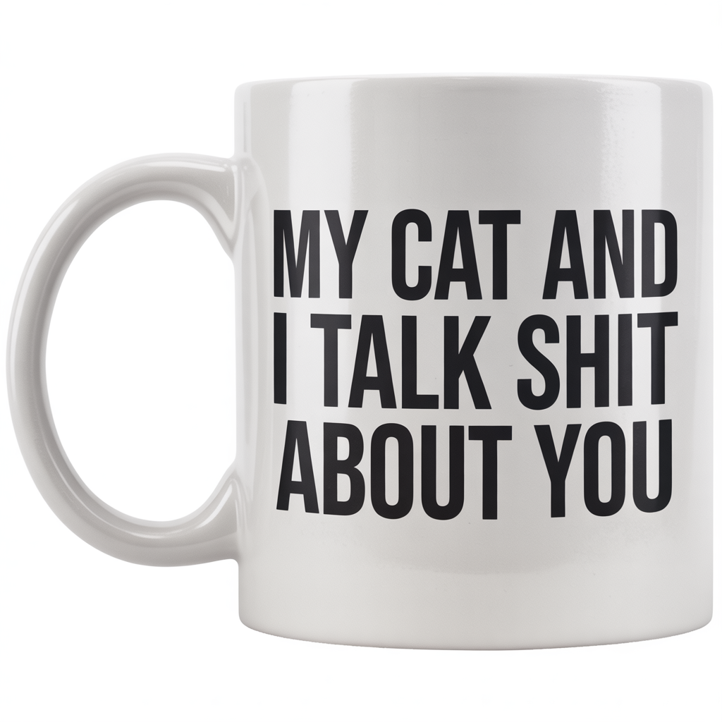 Front view of a white ceramic coffee mug with 'My Cat And I Talk Shit About You' text, ideal cat lover gift.