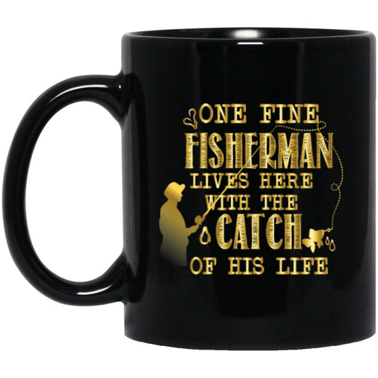 “One fine fisherman lives here with the catch of his life” coffee mug (golden) - Uniquethoughtful