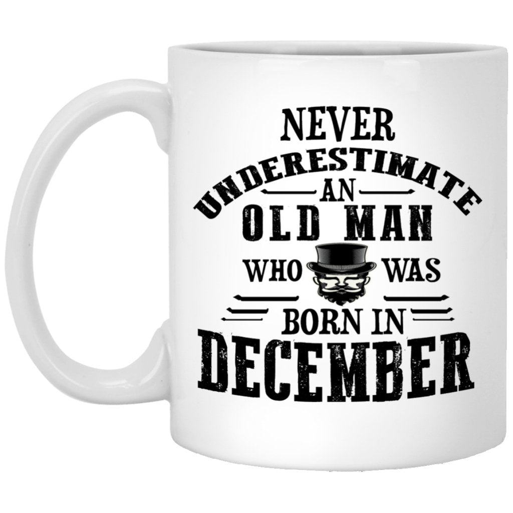 "Never Underestimate an Old Man Who Was Born In December" Coffee Mug - UniqueThoughtful